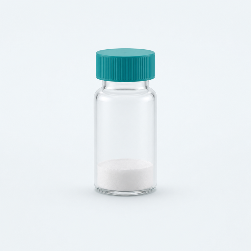 Clear laboratory sample vial containing a white solid with teal cap